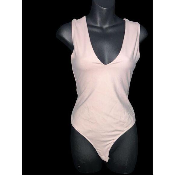 BEAUTIFUL LIGHTWEIGHT Free People Keep It Sleek Bodysuit Pink Size XSmall Sleeve - Picture 1 of 6